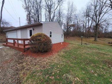 Well-maintained 3-bedroom, 1-bath home with eat-in kitchen and on Cadiz Country Club in Ohio - for sale on GolfHomes.com, golf home, golf lot