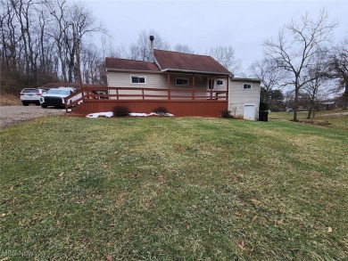 Well-maintained 3-bedroom, 1-bath home with eat-in kitchen and on Cadiz Country Club in Ohio - for sale on GolfHomes.com, golf home, golf lot