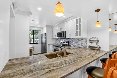 Beautifully furnished first-floor condo with stunning lake and on Bear Lakes Country Club in Florida - for sale on GolfHomes.com, golf home, golf lot