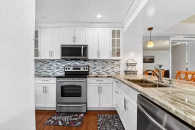 Beautiful first-floor condo with stunning lake and golf course on Bear Lakes Country Club in Florida - for sale on GolfHomes.com, golf home, golf lot