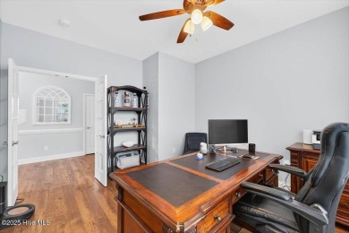This beautifully maintained home sits directly on the golf on Beau Rivage Golf and Resort in North Carolina - for sale on GolfHomes.com, golf home, golf lot