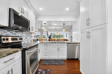 Beautiful first-floor condo with stunning lake and golf course on Bear Lakes Country Club in Florida - for sale on GolfHomes.com, golf home, golf lot