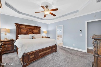 This beautifully maintained home sits directly on the golf on Beau Rivage Golf and Resort in North Carolina - for sale on GolfHomes.com, golf home, golf lot