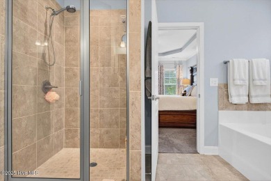 This beautifully maintained home sits directly on the golf on Beau Rivage Golf and Resort in North Carolina - for sale on GolfHomes.com, golf home, golf lot