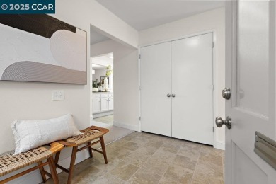 This bright and cheerful Sequoia Wrap end-unit is like a tree on Rossmoor Golf Course in California - for sale on GolfHomes.com, golf home, golf lot