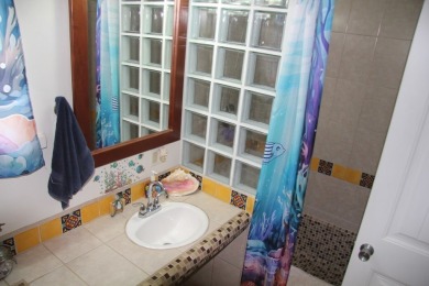 Sea Breezes  Fairway Views--Your Belizean Dream Home Awaits.

 on  in  - for sale on GolfHomes.com, golf home, golf lot