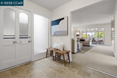 This bright and cheerful Sequoia Wrap end-unit is like a tree on Rossmoor Golf Course in California - for sale on GolfHomes.com, golf home, golf lot