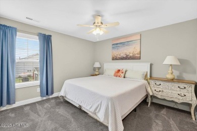 This beautifully maintained home sits directly on the golf on Beau Rivage Golf and Resort in North Carolina - for sale on GolfHomes.com, golf home, golf lot