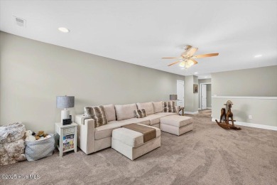 This beautifully maintained home sits directly on the golf on Beau Rivage Golf and Resort in North Carolina - for sale on GolfHomes.com, golf home, golf lot