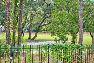 This beautifully maintained home sits directly on the golf on Beau Rivage Golf and Resort in North Carolina - for sale on GolfHomes.com, golf home, golf lot