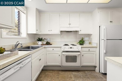 This bright and cheerful Sequoia Wrap end-unit is like a tree on Rossmoor Golf Course in California - for sale on GolfHomes.com, golf home, golf lot