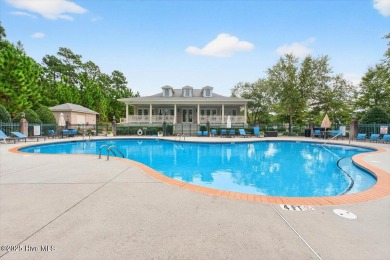 This beautifully maintained home sits directly on the golf on Beau Rivage Golf and Resort in North Carolina - for sale on GolfHomes.com, golf home, golf lot