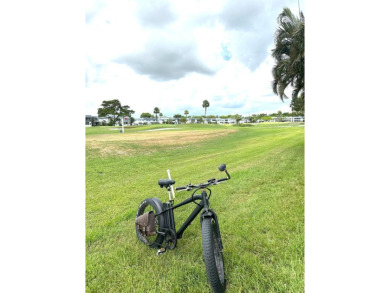 Located in Kings Point, an active 55+ gated community, this on Kings Point Golf - Executive in Florida - for sale on GolfHomes.com, golf home, golf lot