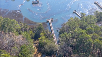 End-unit 4-bedroom, 3-bath townhome thoughtfully maintained in on Charleston National Golf Club in South Carolina - for sale on GolfHomes.com, golf home, golf lot