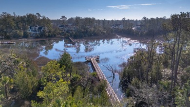 End-unit 4-bedroom, 3-bath townhome thoughtfully maintained in on Charleston National Golf Club in South Carolina - for sale on GolfHomes.com, golf home, golf lot