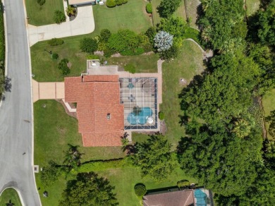 Tucked away on a serene half acre canal front homesite inside on Meadowood Golf and Tennis Club in Florida - for sale on GolfHomes.com, golf home, golf lot