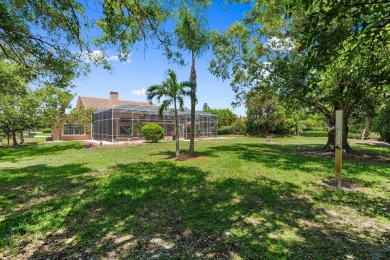 Tucked away on a serene half acre canal front homesite inside on Meadowood Golf and Tennis Club in Florida - for sale on GolfHomes.com, golf home, golf lot