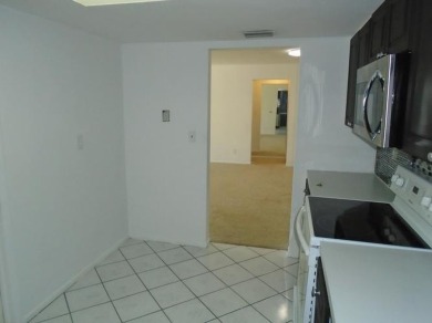 Larger model home in the highly sought-after golf course on Leisureville Community Association in Florida - for sale on GolfHomes.com, golf home, golf lot