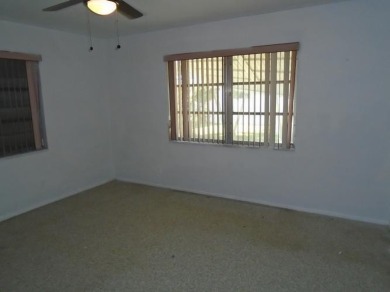 Larger model home in the highly sought-after golf course on Leisureville Community Association in Florida - for sale on GolfHomes.com, golf home, golf lot