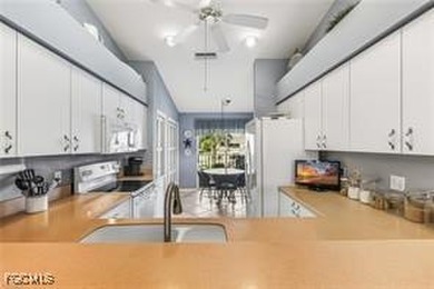 Escape the cold and step into the vibrant, low-density lifestyle on Olde Hickory Golf and Country Club in Florida - for sale on GolfHomes.com, golf home, golf lot