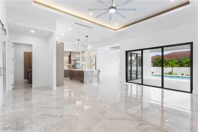 Immerse yourself in the EPITOME of CONTEMPORARY LUXURY, INVITING on Palmetto-Pine Country Club in Florida - for sale on GolfHomes.com, golf home, golf lot