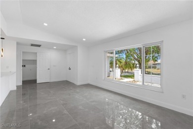 This stunning Renovated home IS STURDY AS STEEL AND NOTHING TO on Port Charlotte Golf Club in Florida - for sale on GolfHomes.com, golf home, golf lot