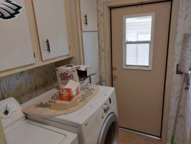 Beautiful Corner Lot partially furnished home with 2 bedrooms, 2 on Pine Lakes Country Club in Florida - for sale on GolfHomes.com, golf home, golf lot