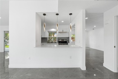 This stunning Renovated home IS STURDY AS STEEL AND NOTHING TO on Port Charlotte Golf Club in Florida - for sale on GolfHomes.com, golf home, golf lot