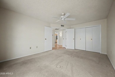 Welcome to this charming single-level attached home in Sun City on Sun City Lakes West and East in Arizona - for sale on GolfHomes.com, golf home, golf lot