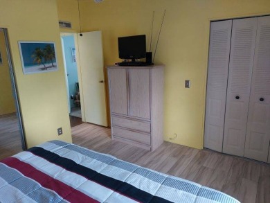 Beautiful Corner Lot partially furnished home with 2 bedrooms, 2 on Pine Lakes Country Club in Florida - for sale on GolfHomes.com, golf home, golf lot