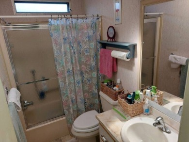 Beautiful Corner Lot partially furnished home with 2 bedrooms, 2 on Pine Lakes Country Club in Florida - for sale on GolfHomes.com, golf home, golf lot