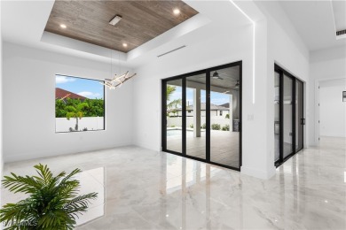 Immerse yourself in the EPITOME of CONTEMPORARY LUXURY, INVITING on Palmetto-Pine Country Club in Florida - for sale on GolfHomes.com, golf home, golf lot