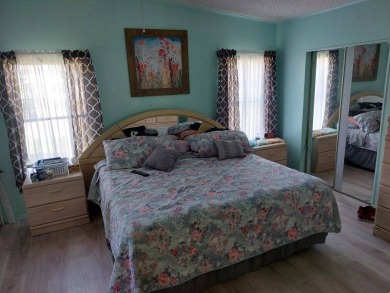 Beautiful Corner Lot partially furnished home with 2 bedrooms, 2 on Pine Lakes Country Club in Florida - for sale on GolfHomes.com, golf home, golf lot
