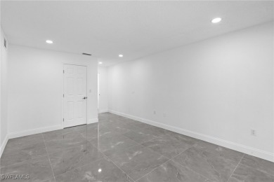 This stunning Renovated home IS STURDY AS STEEL AND NOTHING TO on Port Charlotte Golf Club in Florida - for sale on GolfHomes.com, golf home, golf lot