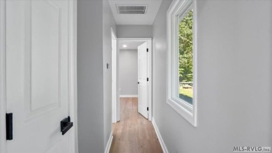 Completely remodeled inside and out, this 3-bedroom, 3-bath home on Tanglewood Shores Golf Club in Virginia - for sale on GolfHomes.com, golf home, golf lot