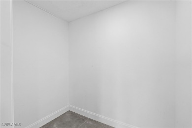 This stunning Renovated home IS STURDY AS STEEL AND NOTHING TO on Port Charlotte Golf Club in Florida - for sale on GolfHomes.com, golf home, golf lot