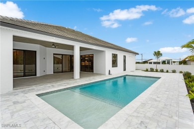 Immerse yourself in the EPITOME of CONTEMPORARY LUXURY, INVITING on Palmetto-Pine Country Club in Florida - for sale on GolfHomes.com, golf home, golf lot