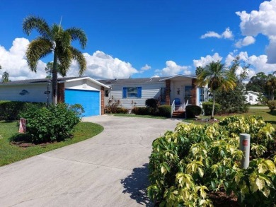 Beautiful Corner Lot partially furnished home with 2 bedrooms, 2 on Pine Lakes Country Club in Florida - for sale on GolfHomes.com, golf home, golf lot