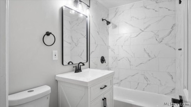 Completely remodeled inside and out, this 3-bedroom, 3-bath home on Tanglewood Shores Golf Club in Virginia - for sale on GolfHomes.com, golf home, golf lot