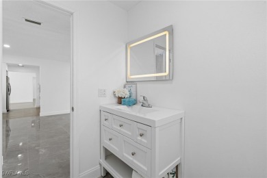 This stunning Renovated home IS STURDY AS STEEL AND NOTHING TO on Port Charlotte Golf Club in Florida - for sale on GolfHomes.com, golf home, golf lot
