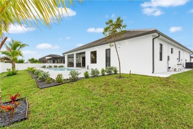 Immerse yourself in the EPITOME of CONTEMPORARY LUXURY, INVITING on Palmetto-Pine Country Club in Florida - for sale on GolfHomes.com, golf home, golf lot