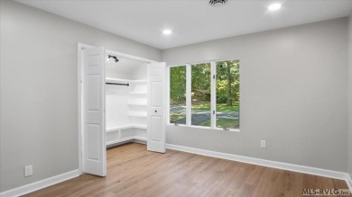 Completely remodeled inside and out, this 3-bedroom, 3-bath home on Tanglewood Shores Golf Club in Virginia - for sale on GolfHomes.com, golf home, golf lot