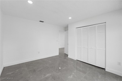 This stunning Renovated home IS STURDY AS STEEL AND NOTHING TO on Port Charlotte Golf Club in Florida - for sale on GolfHomes.com, golf home, golf lot