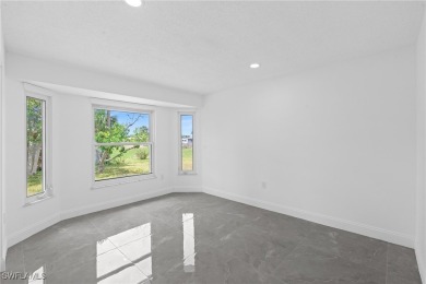 This stunning Renovated home IS STURDY AS STEEL AND NOTHING TO on Port Charlotte Golf Club in Florida - for sale on GolfHomes.com, golf home, golf lot