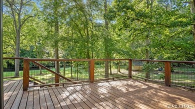 Completely remodeled inside and out, this 3-bedroom, 3-bath home on Tanglewood Shores Golf Club in Virginia - for sale on GolfHomes.com, golf home, golf lot