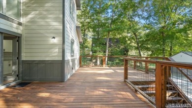 Completely remodeled inside and out, this 3-bedroom, 3-bath home on Tanglewood Shores Golf Club in Virginia - for sale on GolfHomes.com, golf home, golf lot