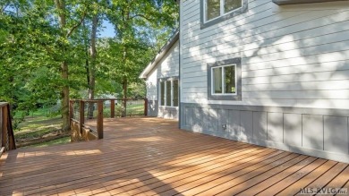 Completely remodeled inside and out, this 3-bedroom, 3-bath home on Tanglewood Shores Golf Club in Virginia - for sale on GolfHomes.com, golf home, golf lot