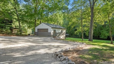 Completely remodeled inside and out, this 3-bedroom, 3-bath home on Tanglewood Shores Golf Club in Virginia - for sale on GolfHomes.com, golf home, golf lot