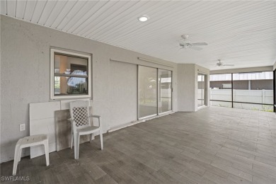 This stunning Renovated home IS STURDY AS STEEL AND NOTHING TO on Port Charlotte Golf Club in Florida - for sale on GolfHomes.com, golf home, golf lot