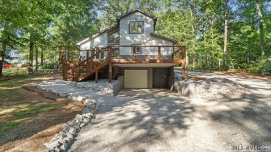 Completely remodeled inside and out, this 3-bedroom, 3-bath home on Tanglewood Shores Golf Club in Virginia - for sale on GolfHomes.com, golf home, golf lot